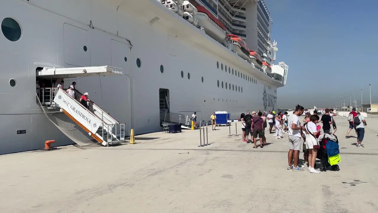 Tourists disembark from the MSC Grandiosa cruise ship for excursions at La Goulette Cruise Port in Tunisia North Africa