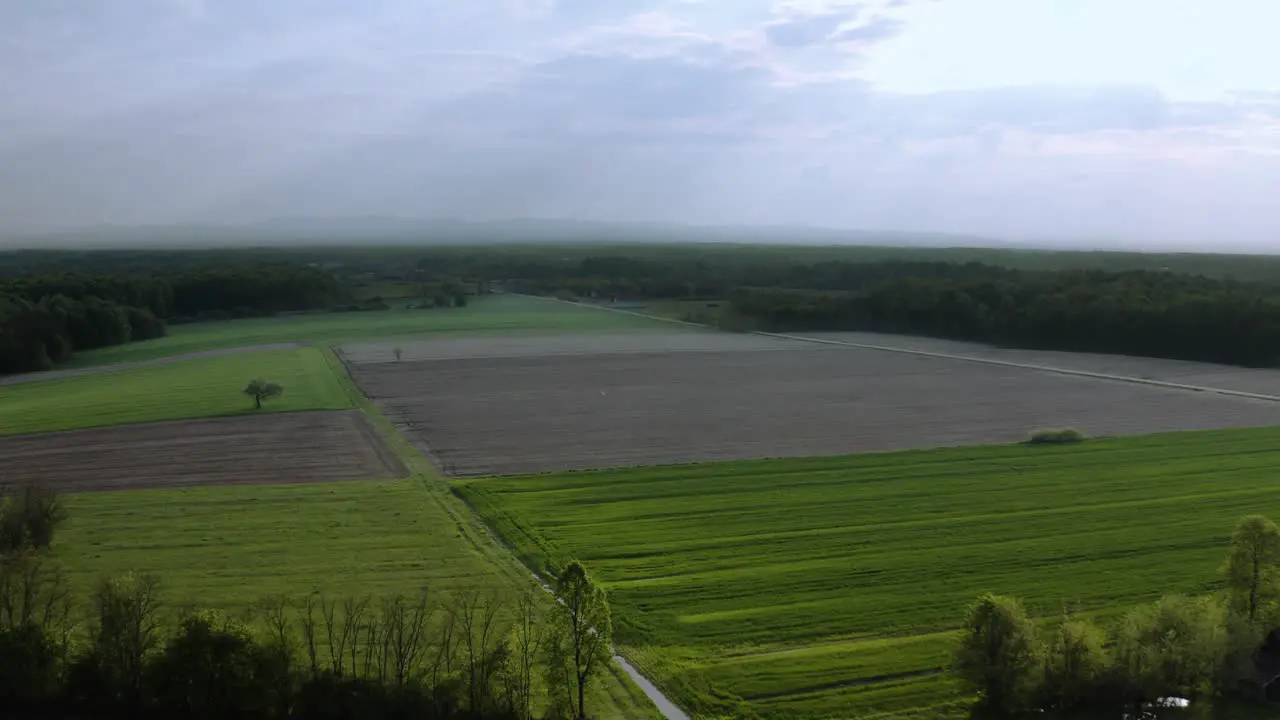 Flying with a drone in middle of old village in Bosnia beautiful view of mountains in distance