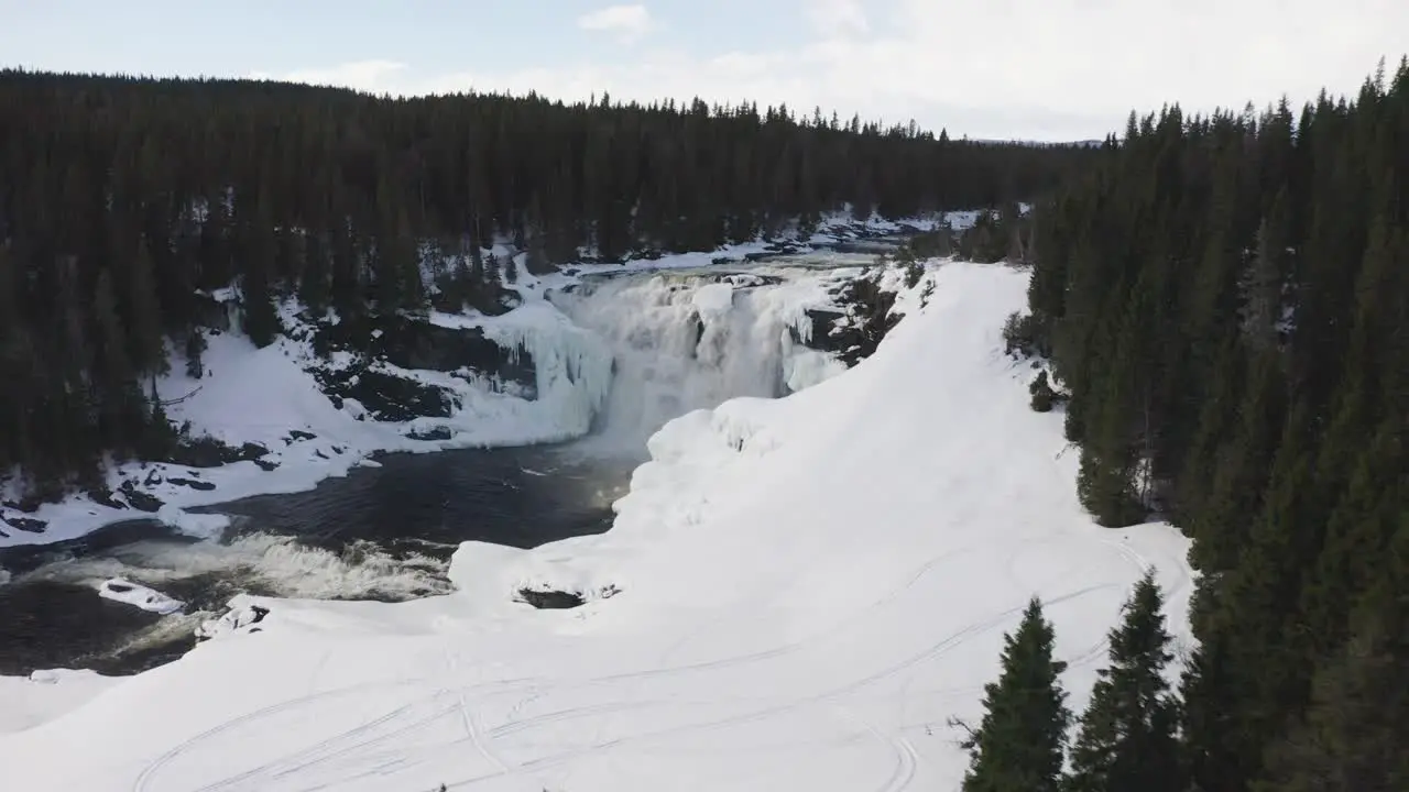 Drone footage of Swedens largest waterfall Tännforsen during spring and flood