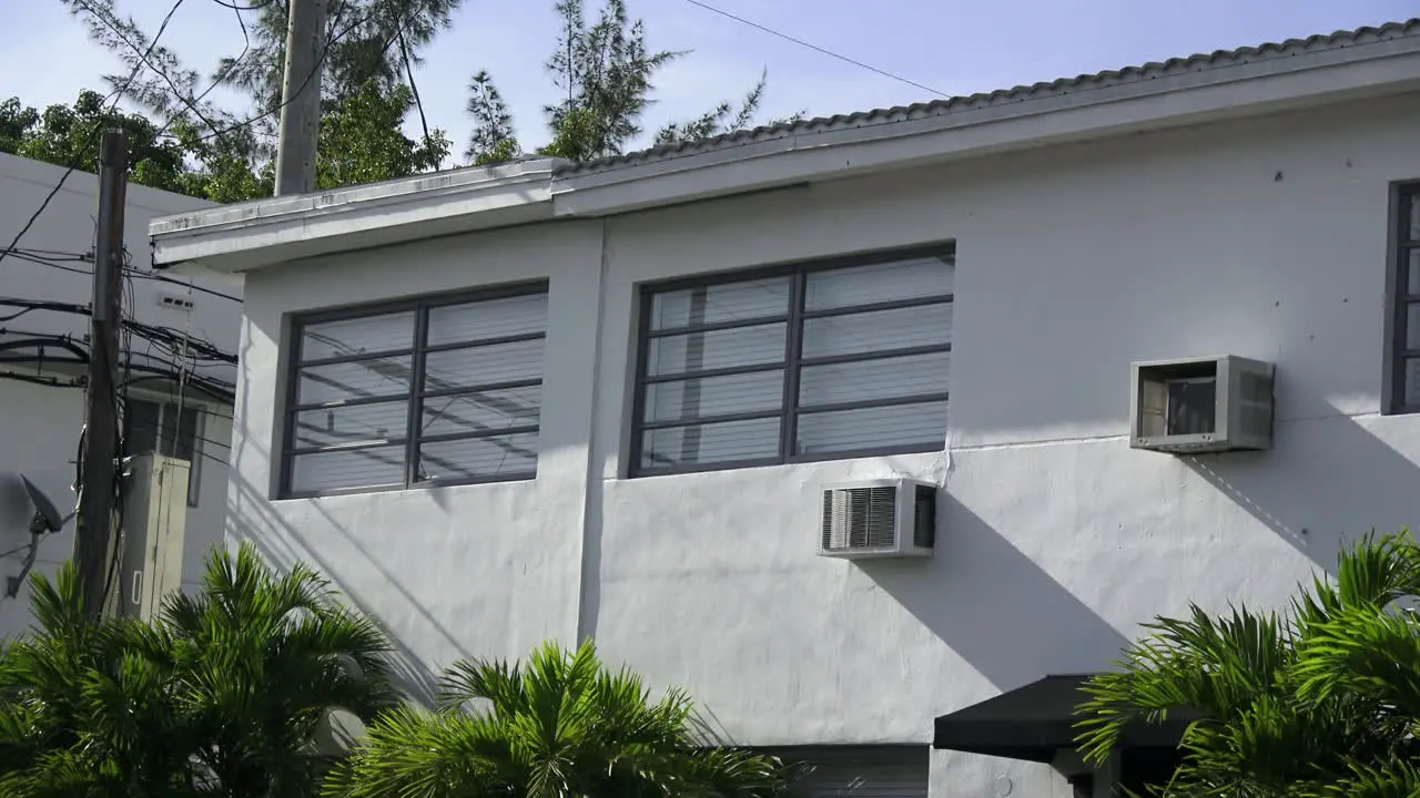 Exterior day apartment building summer or spring with palm trees