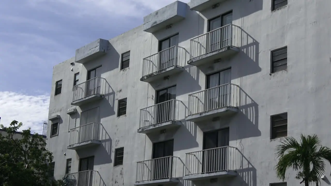 Exterior day apartment building summer or spring with balconies