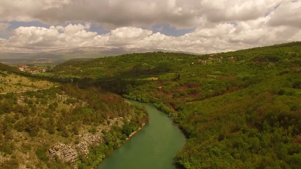 A beautiful river next to a small village