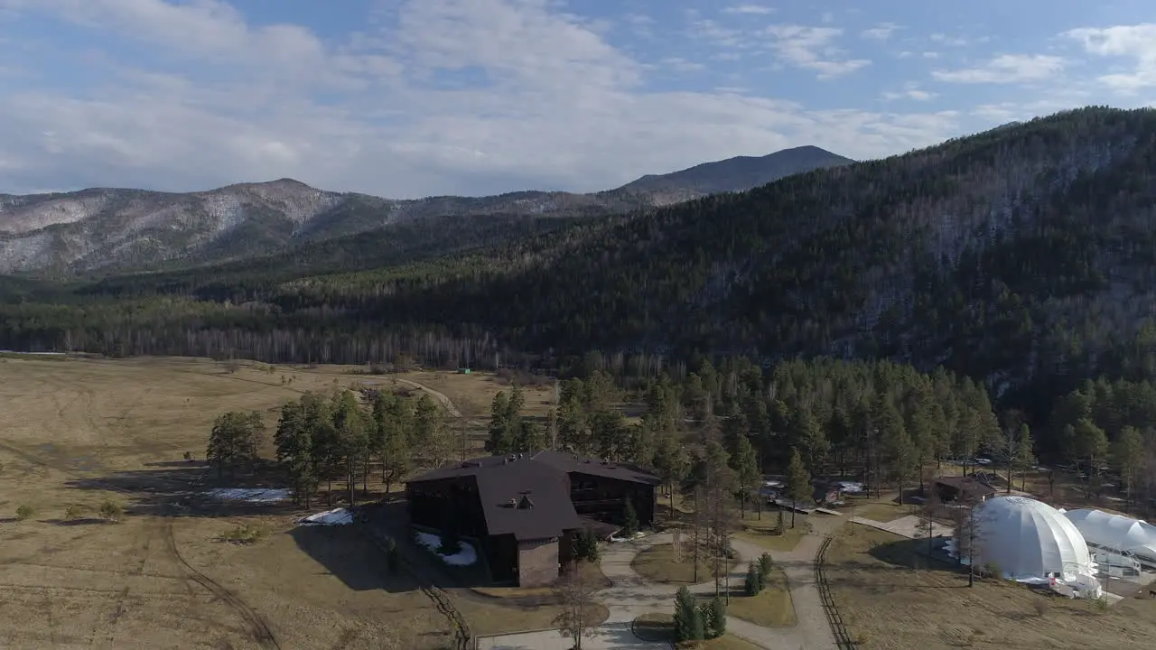 Flight Over Hotel in Siberian Mountains