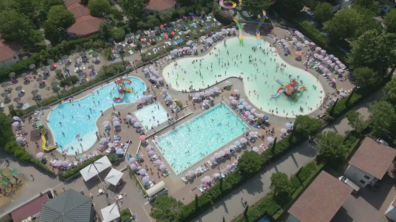 Aerial Shot of People Swimming at Pool in Camping Bella Italia in Lake Garda Italy