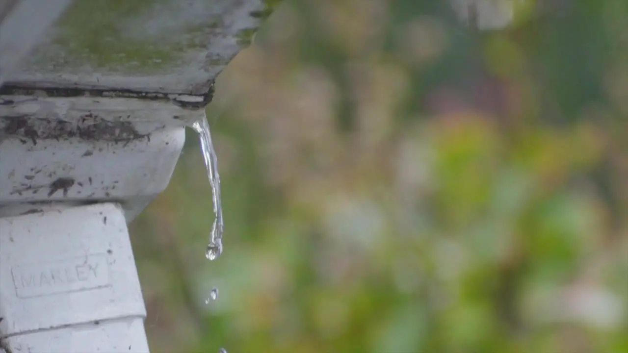 slow motion of water flowing from the waterpipe drainpipe out the house