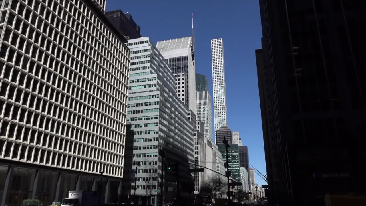 office buildings on a street with corporate look exterior day