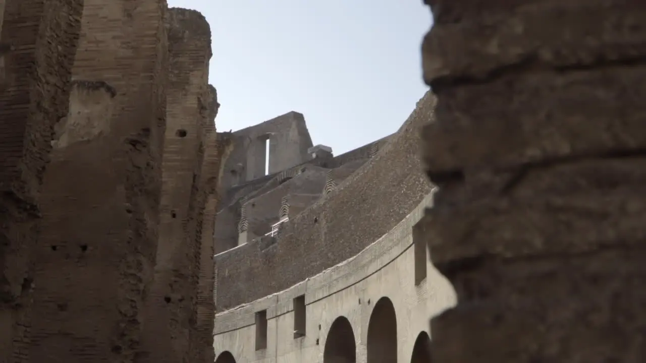 Reveal of Colosseum Walls and Arches in Rome Italy