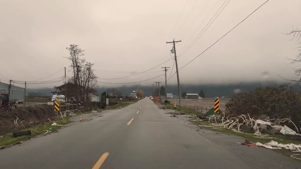 Driving on the road after heavy damage from tornadoes in the Abbotsford BC Canada