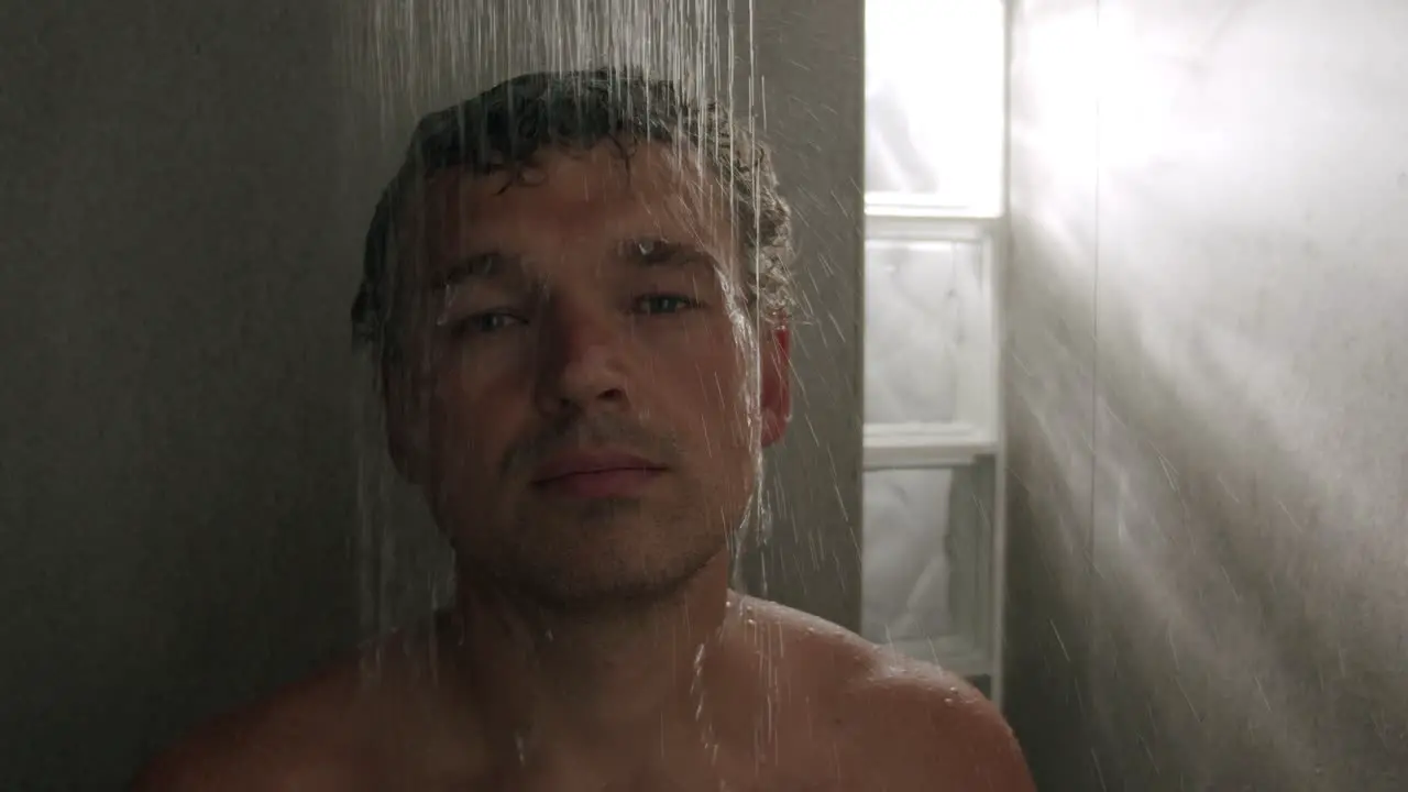 Man feels relaxed during the morning shower