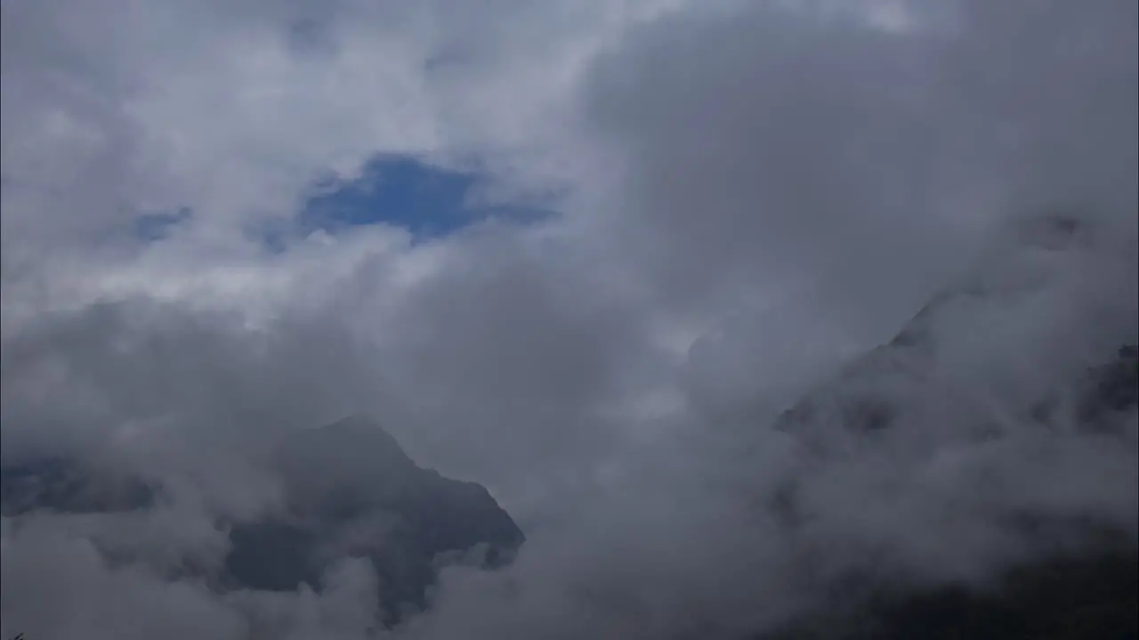 Time-lapse of cloud covering the mountains inside a valley in the high altitude mountain village Lachen Sikkim shot in 4k