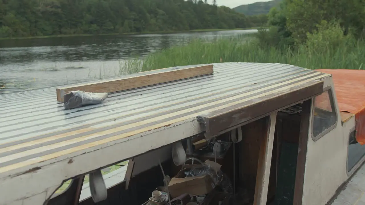 Cabin roof of wooden boat masked and sealed boat maintenance