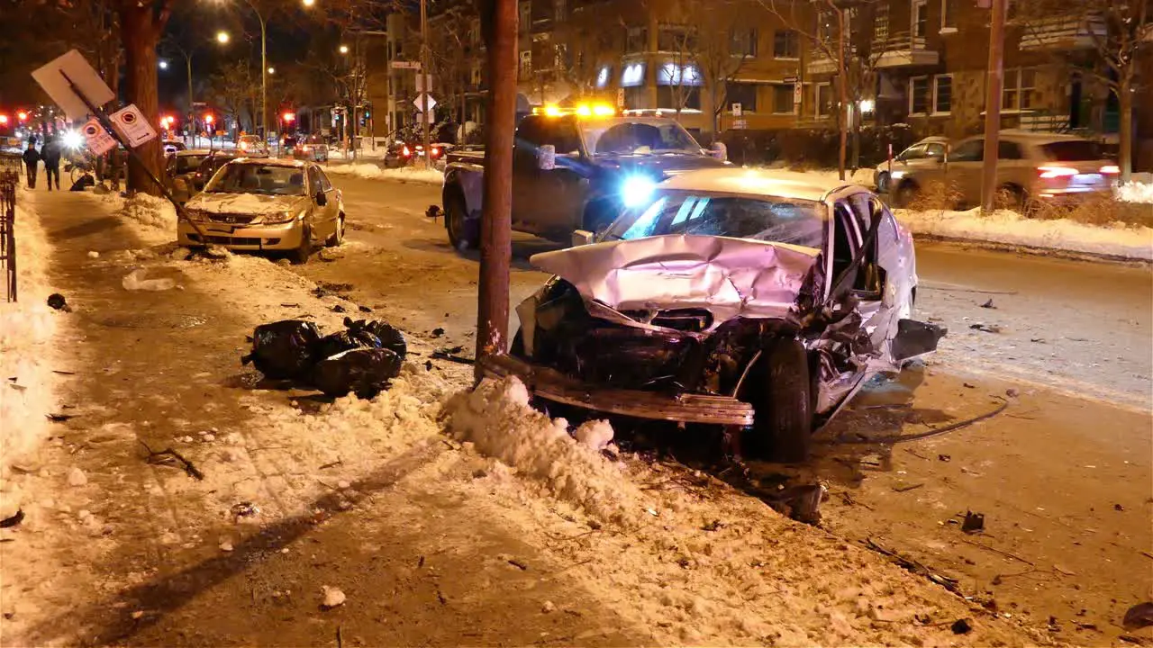 Car accident on a winter snowy night in a Canadian city