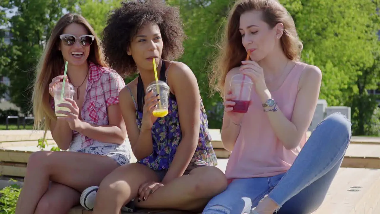 Women sitting with beverages