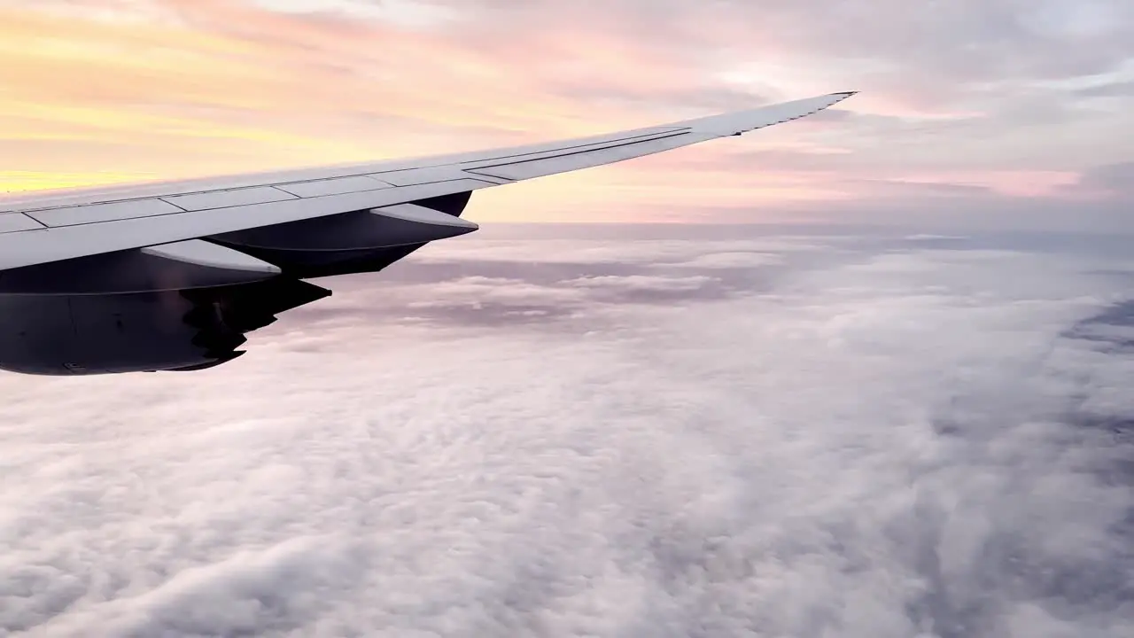 plane at sunset above hurricane looking storm formation