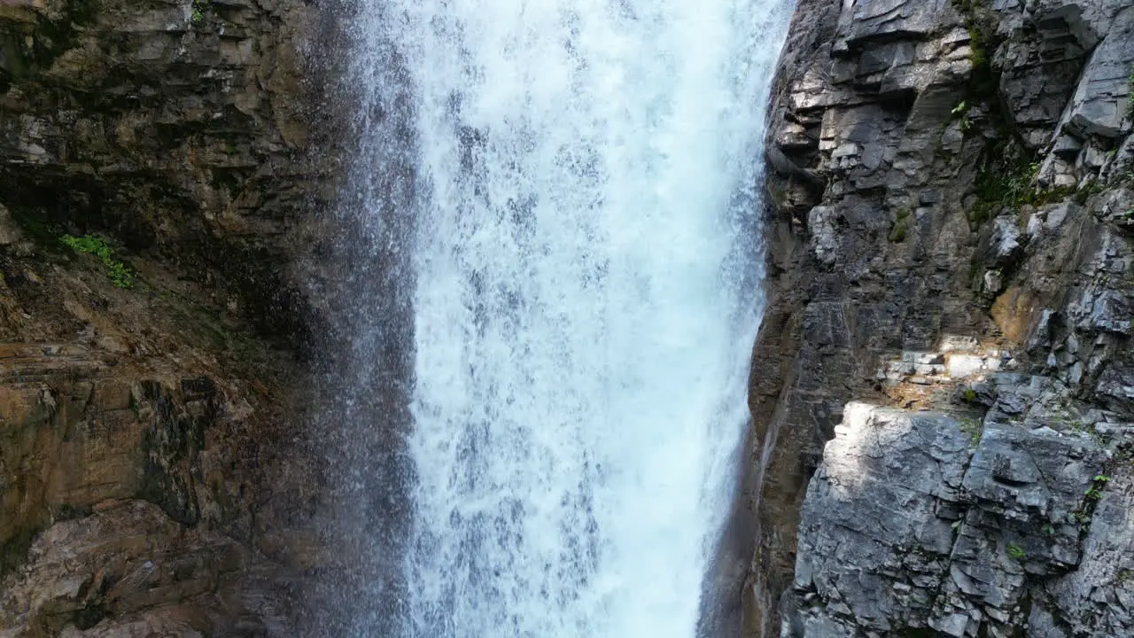 Beautiful Forest Waterfall into Clean Pool of Blue Water [4K Slow Motion