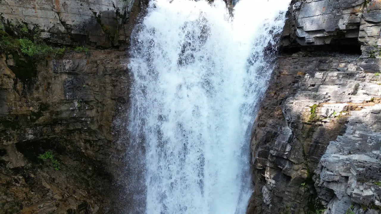 Beautiful Waterfall Flows into Serene Forest Canyon [4K Slow Motion