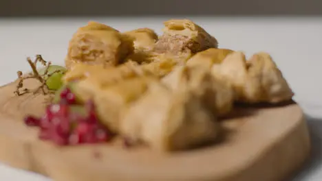 Close Up Of Baklava With Pomegranate Seeds Celebrating Muslim Festival Of Eid