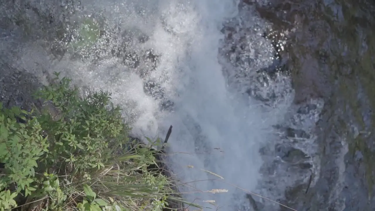 A slow motion close up of a water flowing in a river