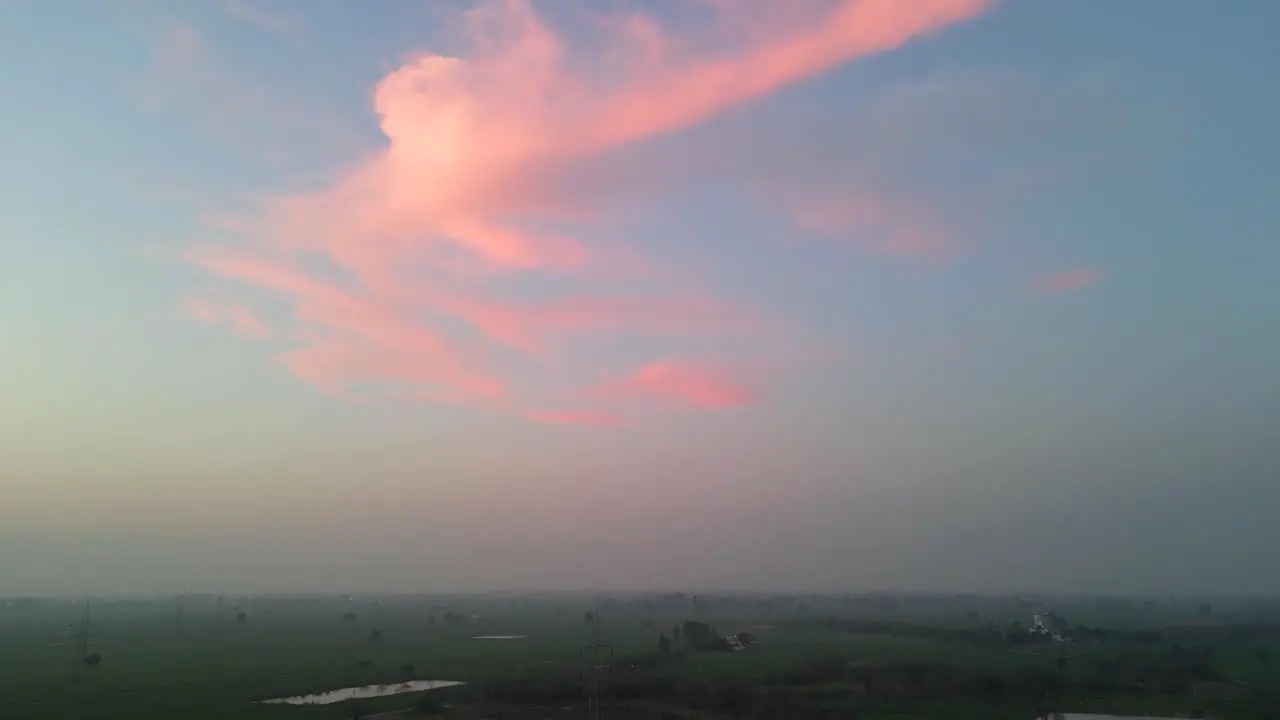 clouds and crop fields bird eye view