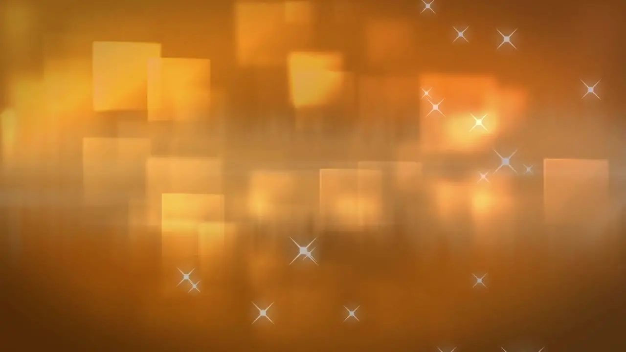 Animation of light spots and squares on orange background