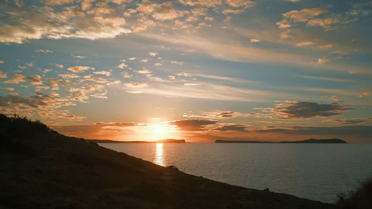 Ibiza Sunset Timelapse looking over the water