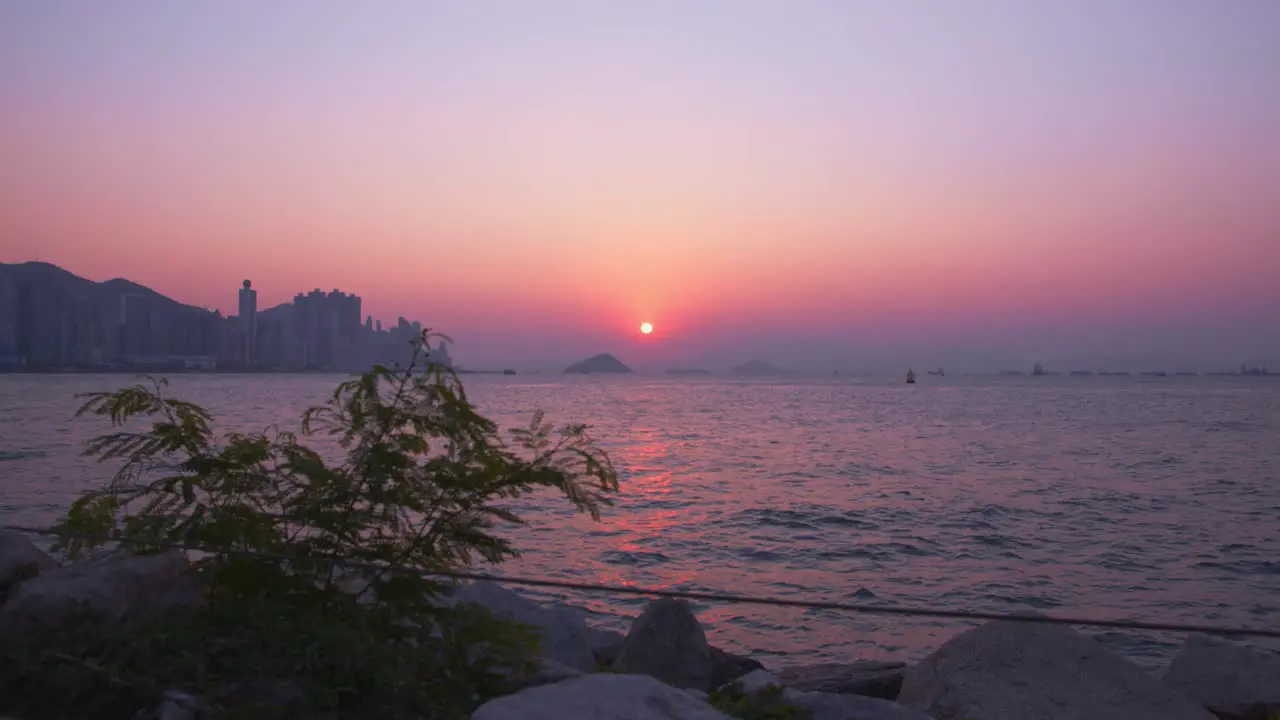 Time Lapse of a Chinese harbor during sunset with all the boat traffic involved