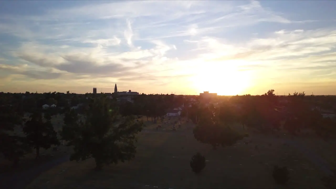 Ascending shot above a cemetery at sunset in Georgia America