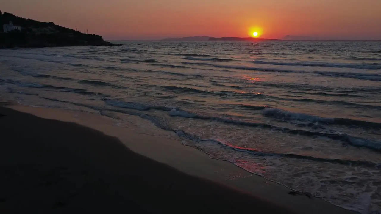 Ocean beach sunset San Stefonos Corfu Greek Island bay