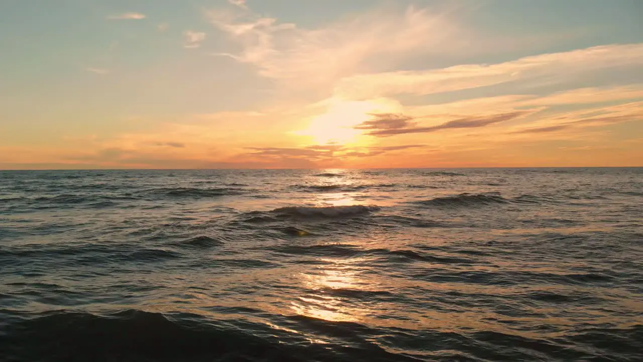 Tidal current waves at sunset Baltic sea Atlantic ocean