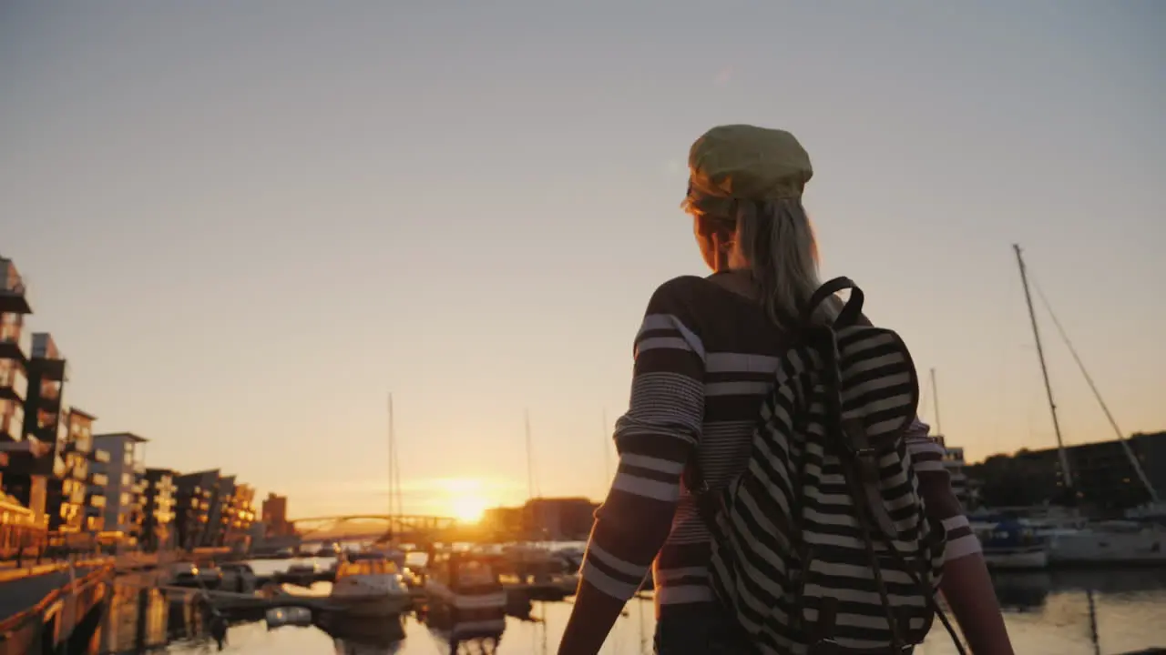 Active Woman Rejoices At Sunrise Over The Marina Runs Forward Raises His Hands Up Sunrise In Bergen