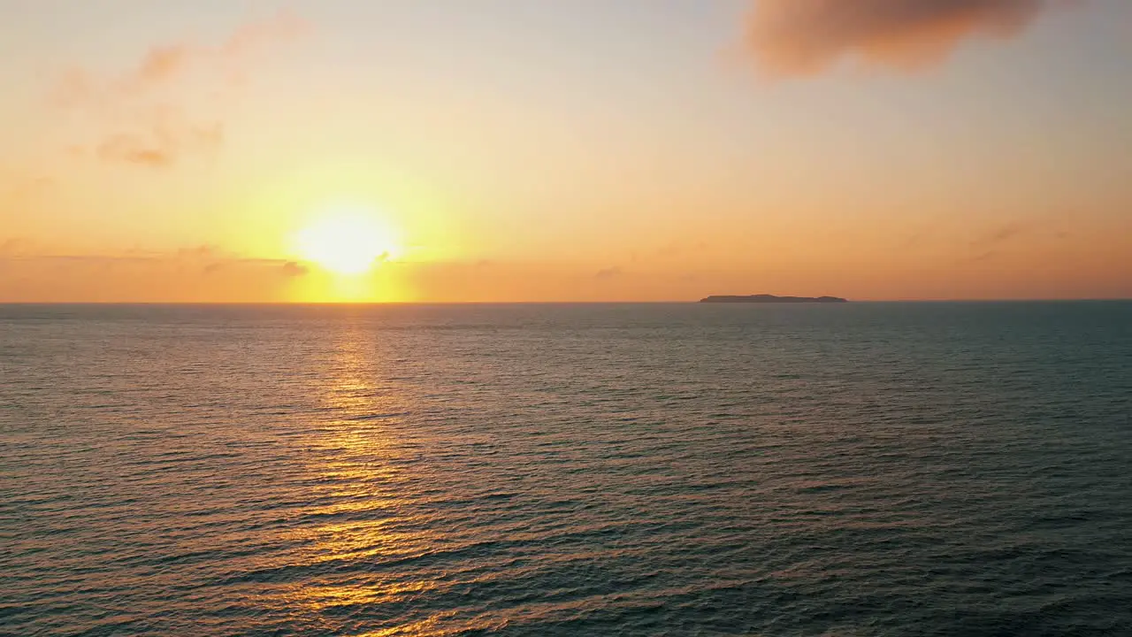 Drone aerial view over beautiful ocean sunrise island South America Santa Catarina Brazil