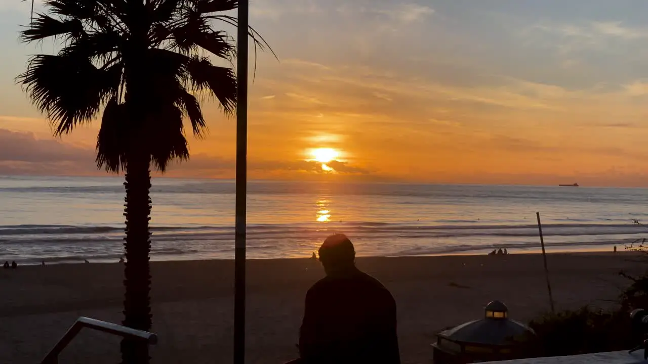 Slow Motion Video Of A Man Smoking A Cigarette At Sunset