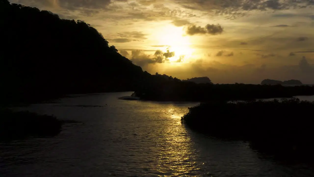 Magical Panama tropical aerial view above golden silhouette coastline tropical island waves