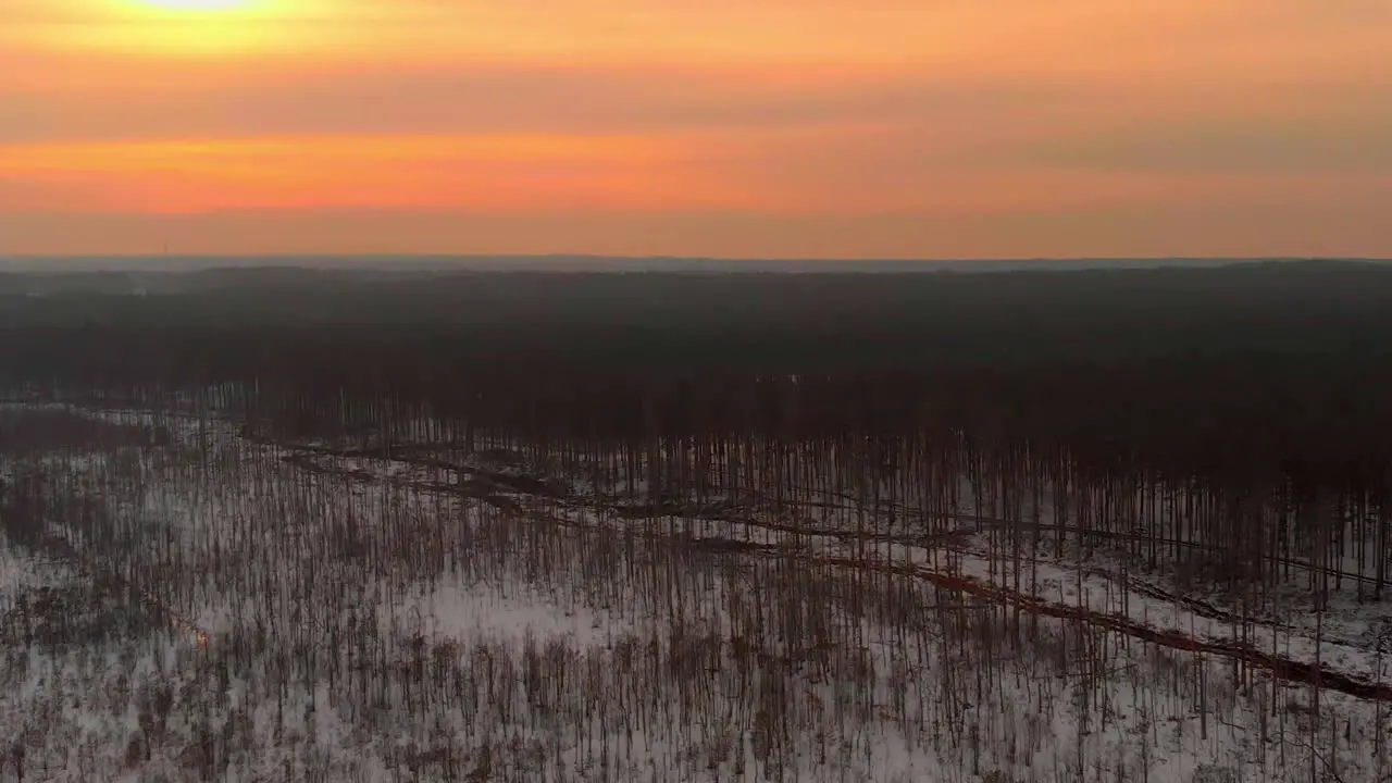 Drone Shot Of Wide Snowy Swamp At Sunset Time Colorful Sky USA