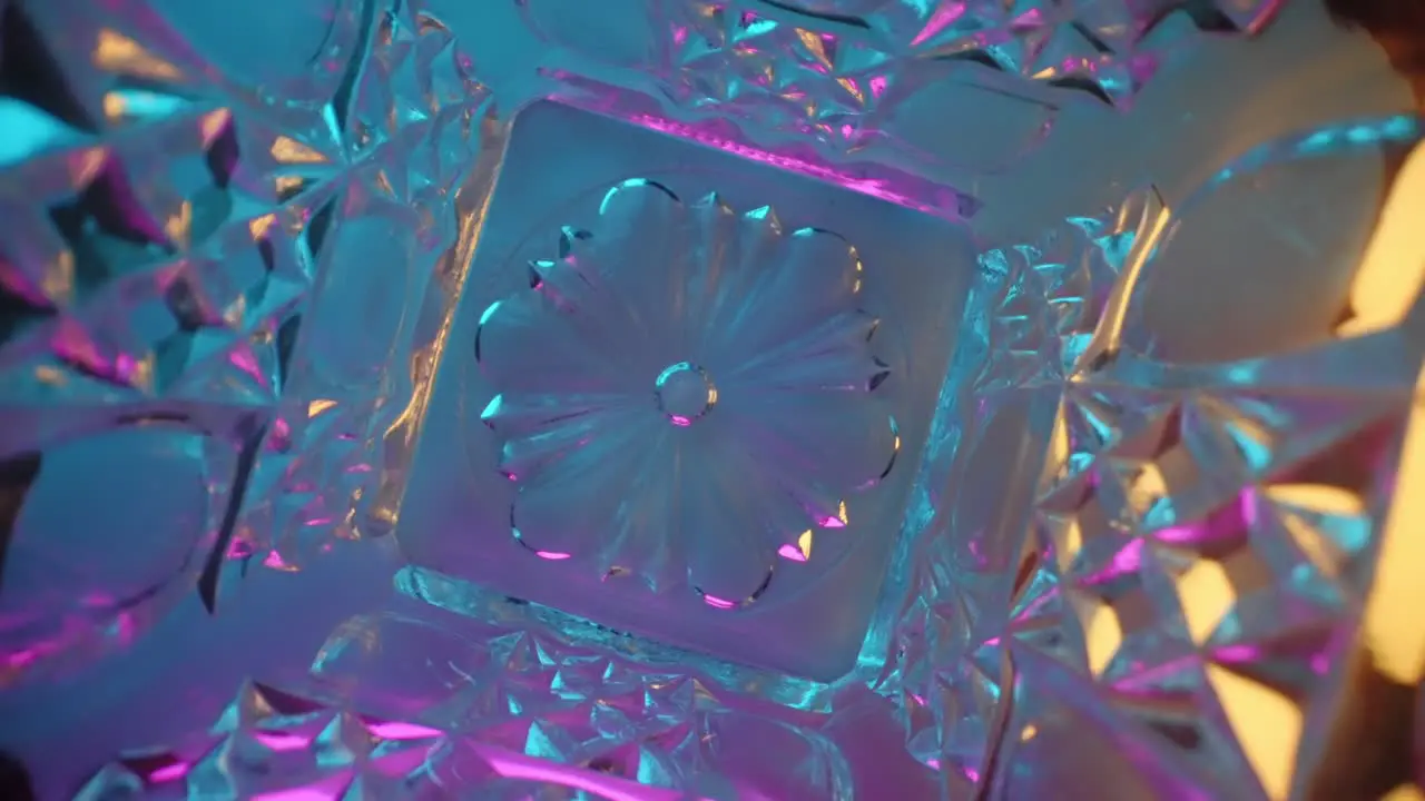 wide angle macro inside a spinning crystal carafe under color-changing lights probe lens