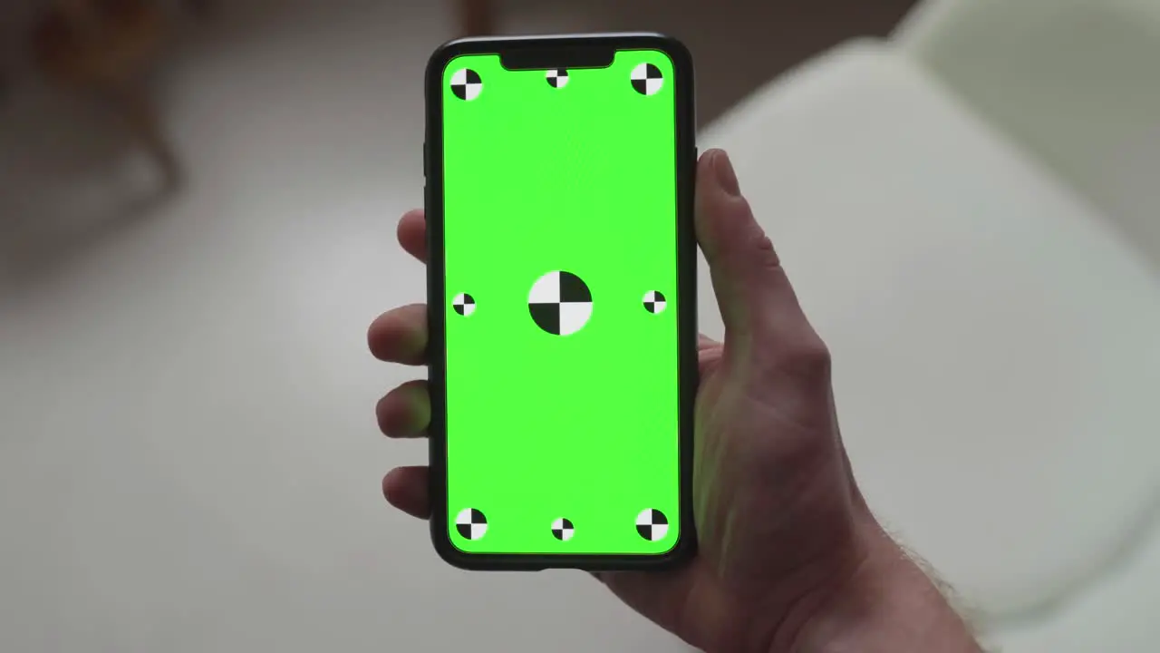 Integrated green screen display on mobile phone device switched off