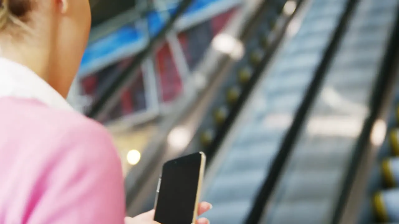 Woman texting on mobile phone