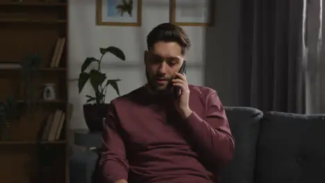 Disappointed Man At Home Receiving Phone Call Telling Him He Has Been Unsuccessful In Job Interview 5