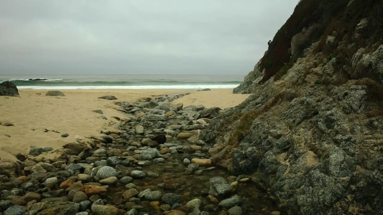 Stoney brook on cloudy Big Sur Garrapata Beach