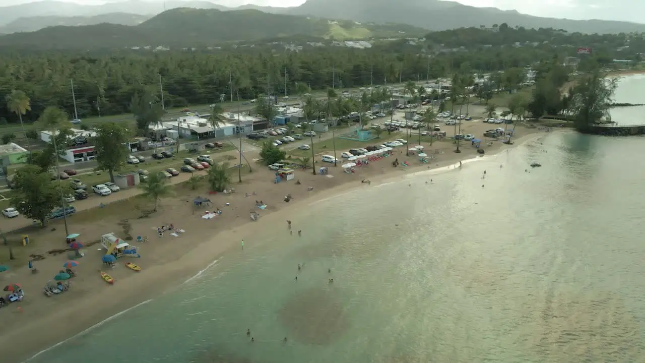 Luquillo Puerto rico kiosko de luquillo playa fortuna aerial shoreline perallel fly over sunset cloudy 4k24