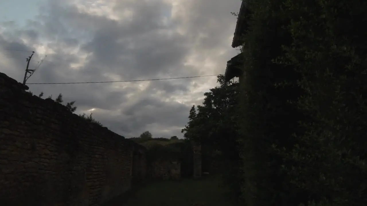 Timelapse of the clouds moving fast in the ruins