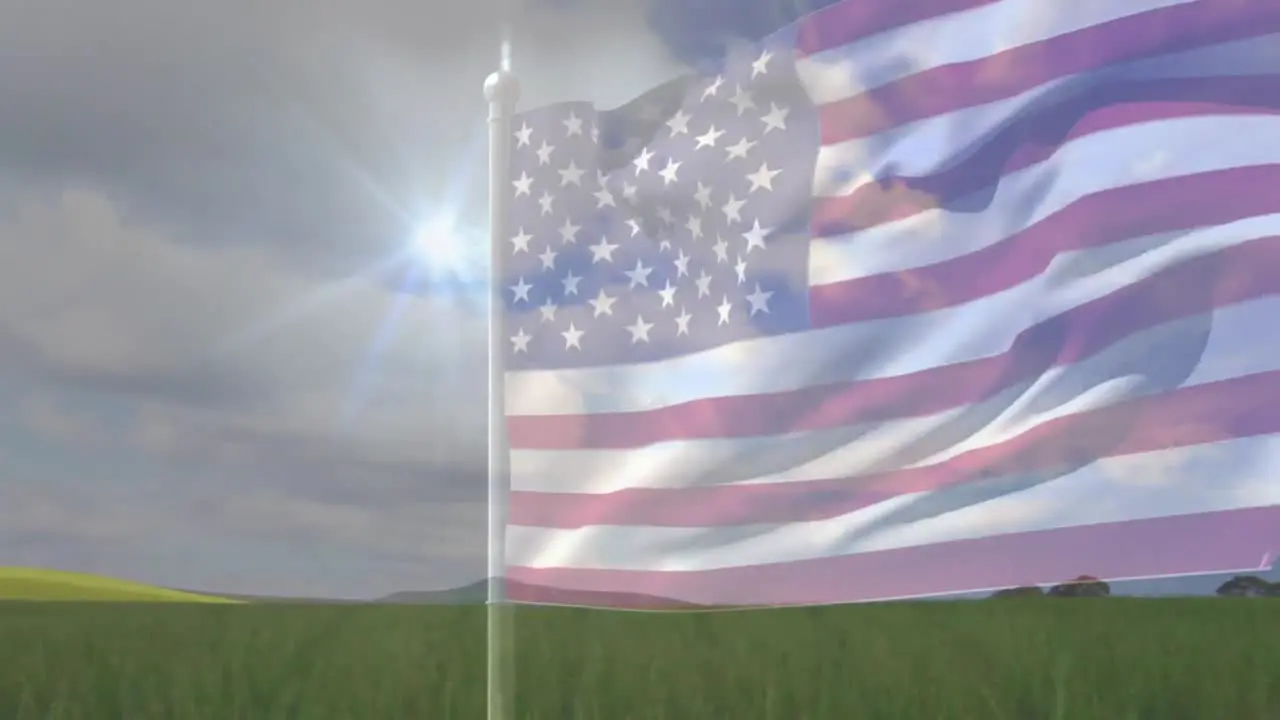 Animation of american flag blowing with green field and flashes in cloudy sky