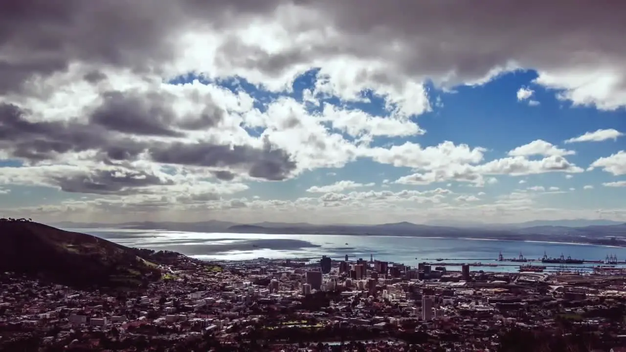 Animation of yellow and white zigzag lines over cloudy sky coast and sea