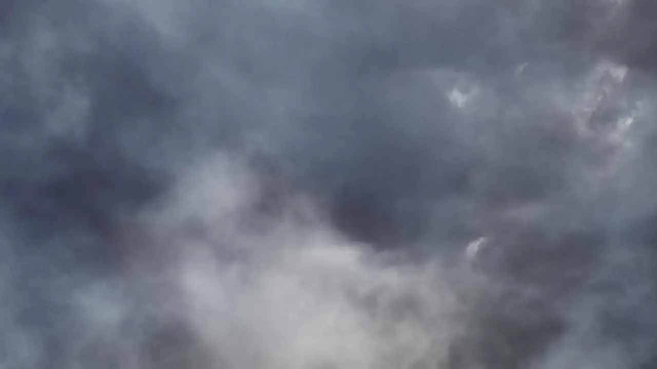 4k a cloud in the dark sky and thunderstorm