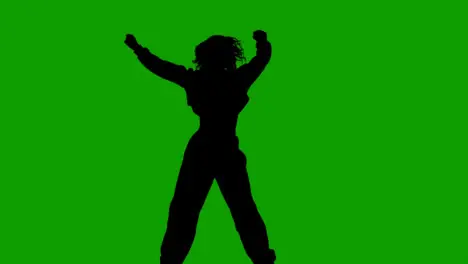 Studio Silhouette Of Woman Dancing Against Green Background 2