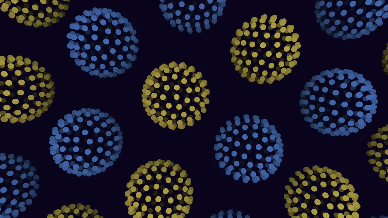 A Group Of Blue And Yellow Spheres