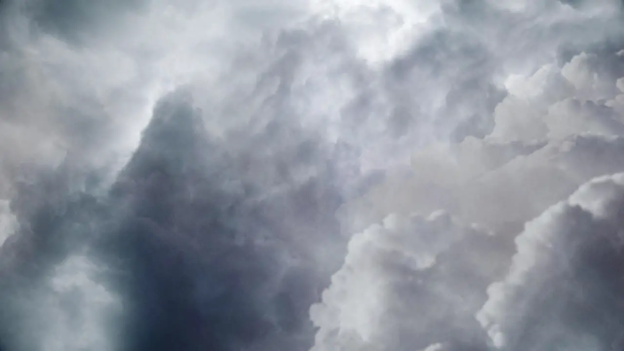 4k view of dark clouds accompanied by flashes in cumulonimbus clouds