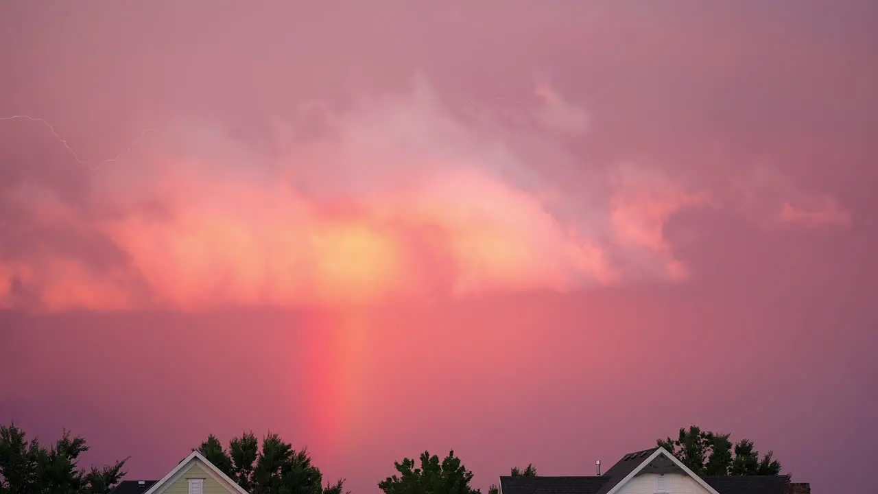 Rainbow And Lightning During Pink Sunset Slow Motion