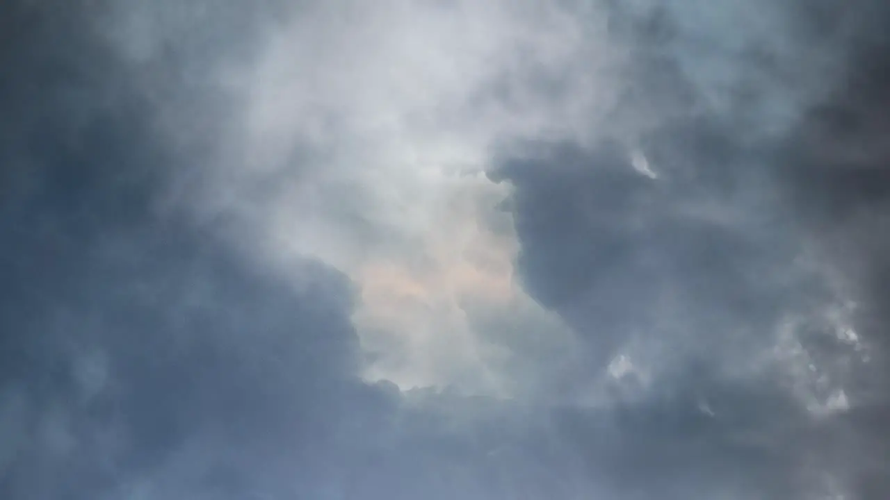 Massive thunderstorm moves with dark clouds