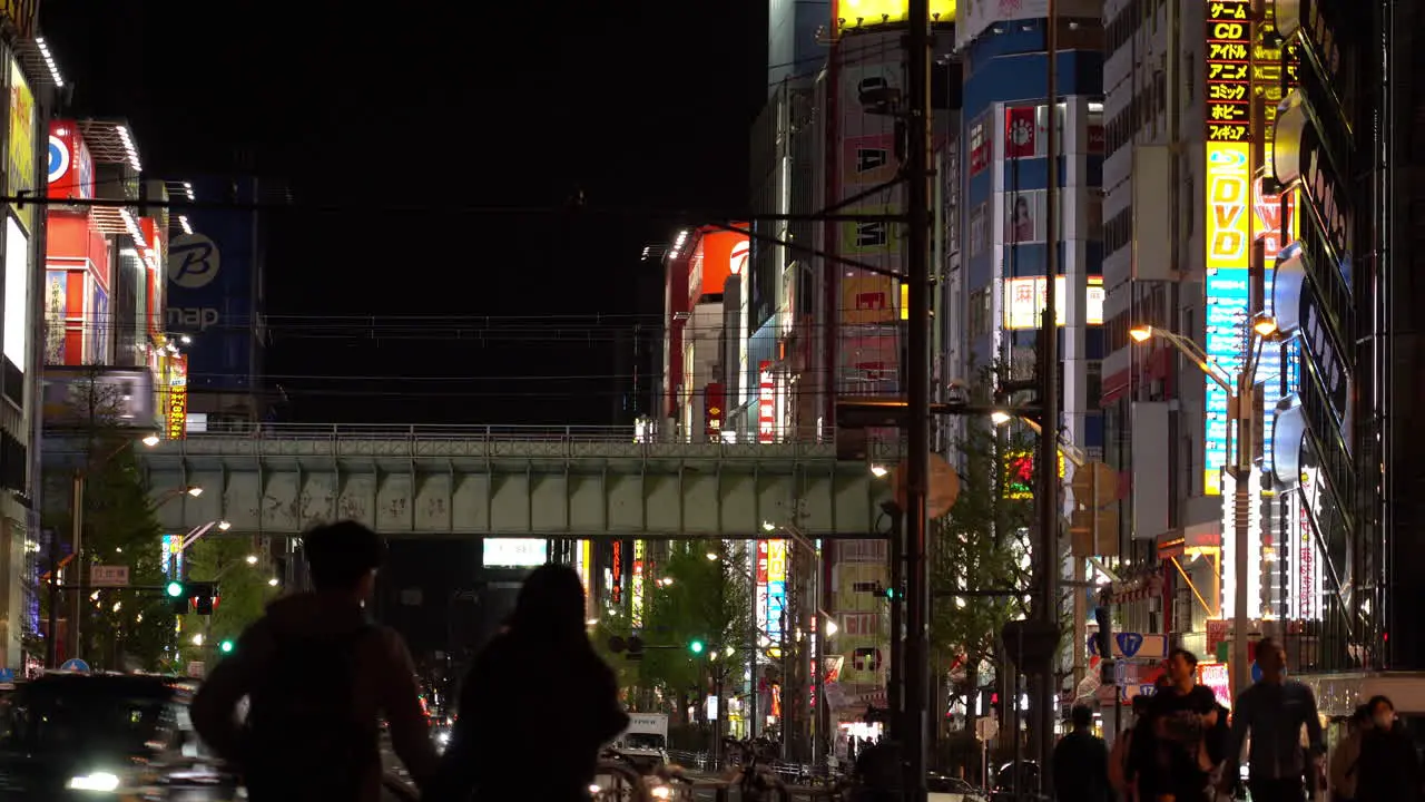 TOKYO JAPAN APRIL 8 2023 Train Mansei Bridge at night in akihabara area